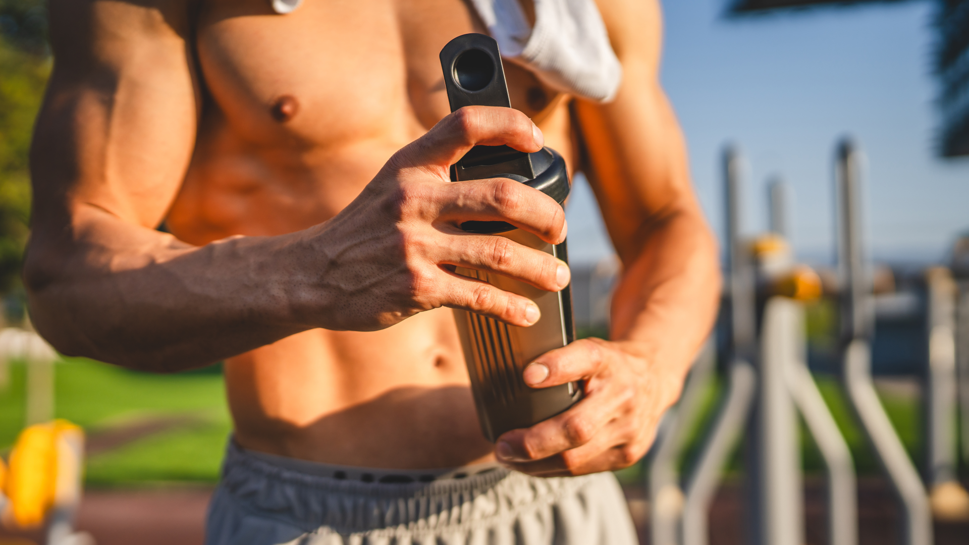 Man holding bodybuilding supplement